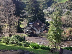 Tupare Gardens -- view of house from street level.  It's all downhill from here!