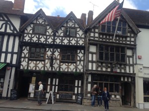 Harvard House (on right) built the year that Shakespeare moved into his home by Thomas Rogers whose grandson would become a founding benefactor of Harvard University.