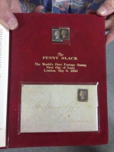 Supposedly this is the original and replica of the first stamp (created in England). Fun stamp fact (and you really wouldn't believe how many there are): the UK does not put their name on their stamps -- just the face or silhouette of the current monarch.